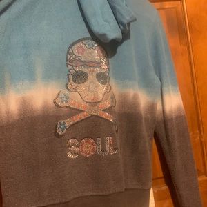 Soul cycle hooded zip up. Embellished skull on back